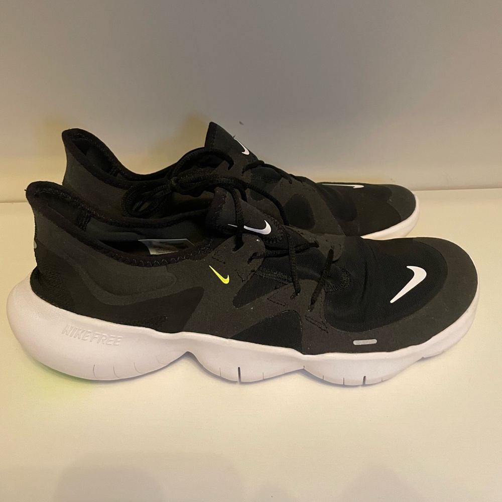 Nike athletic shoes size 11 1/2 never worn brand new Nike free without a box